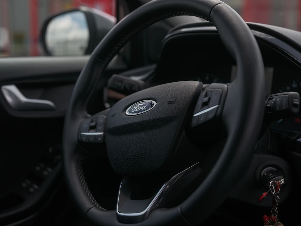Steering wheel and dashboard inside a car