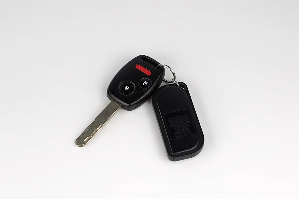 Vehicle key with a remote control